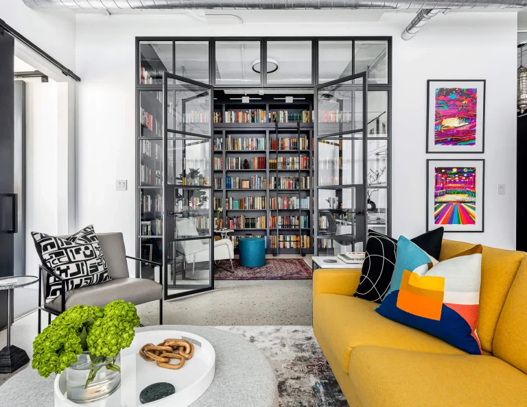 Expansive view of the industrial Eglinton Loft in Toronto, featuring a home library design