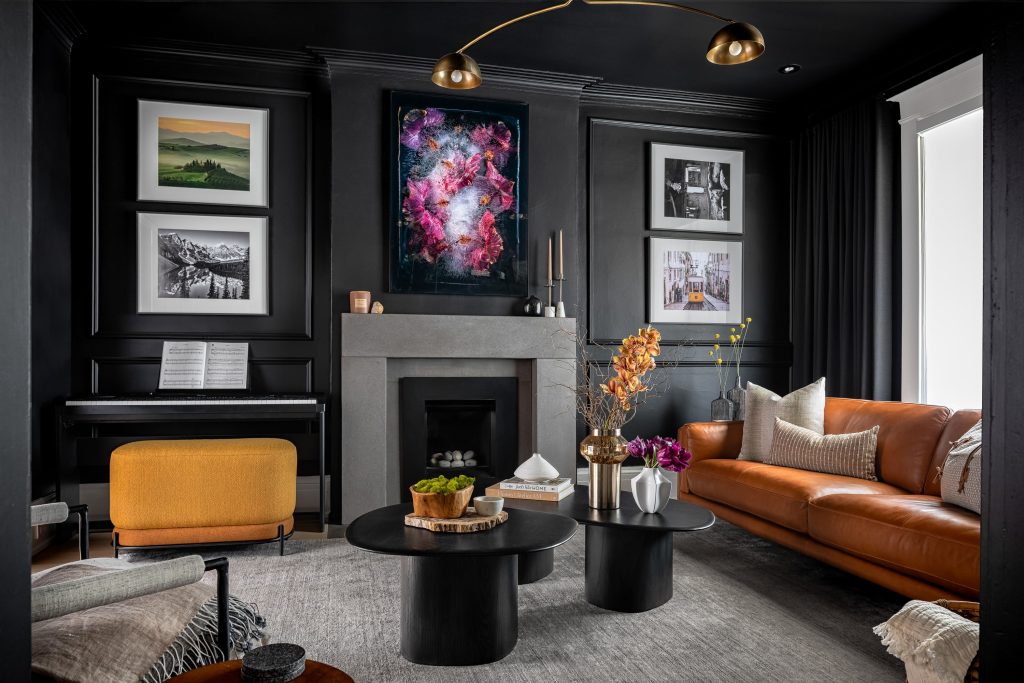 roncesvalles century home design bold black living room caramel leather sofa piano bench scaled