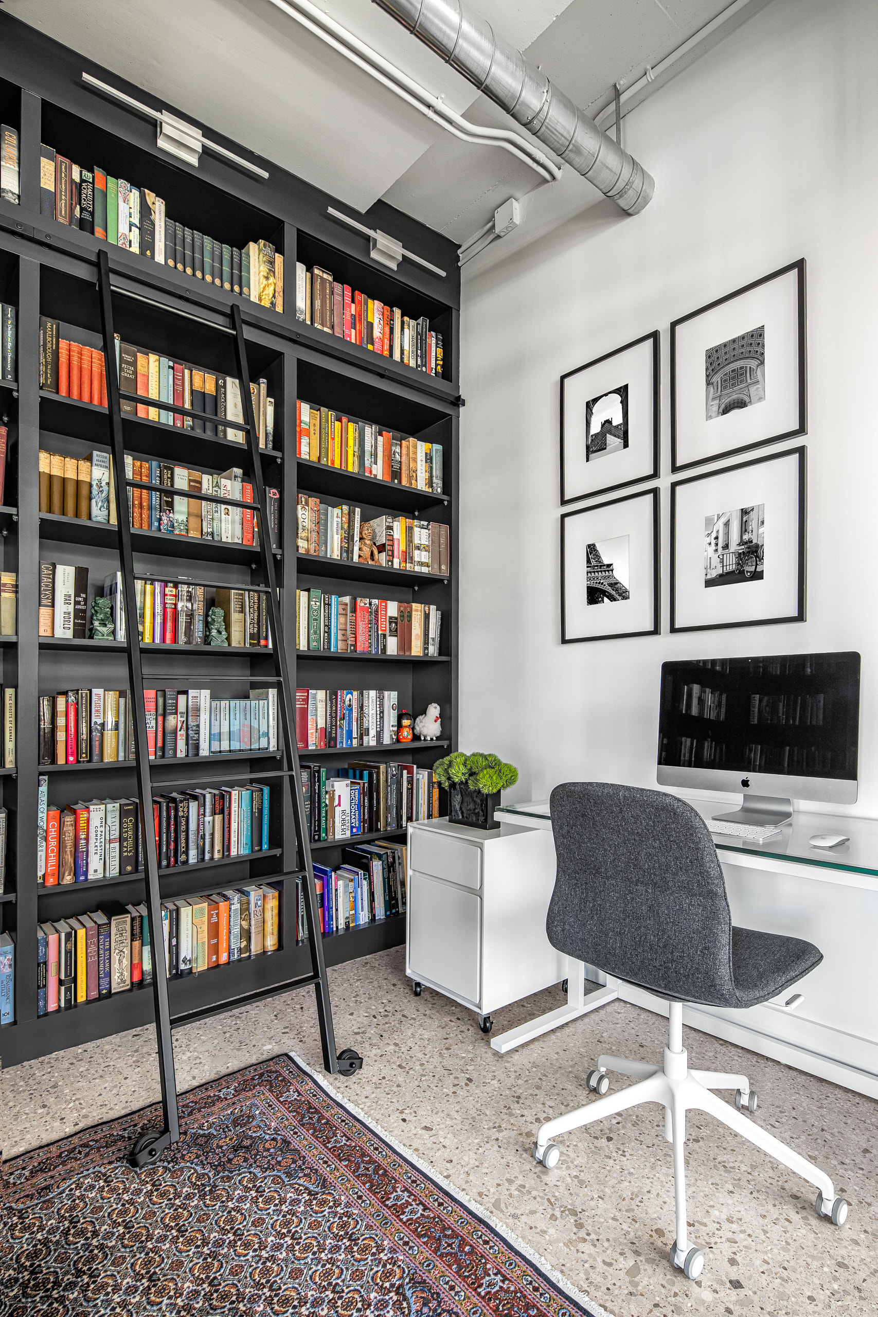 Custom black built in shelving in home library