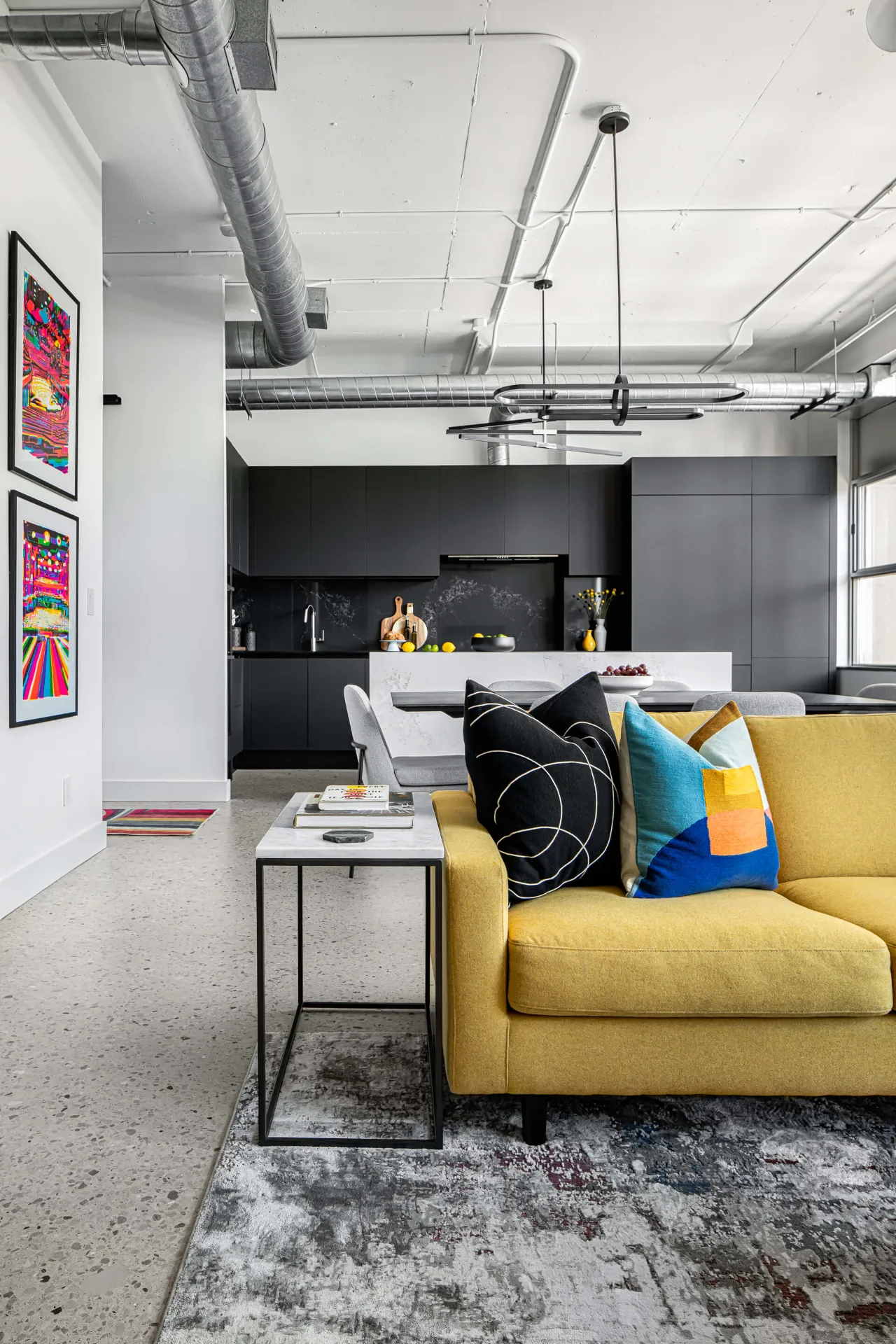 Colorful throw pillows styled on living room sofa