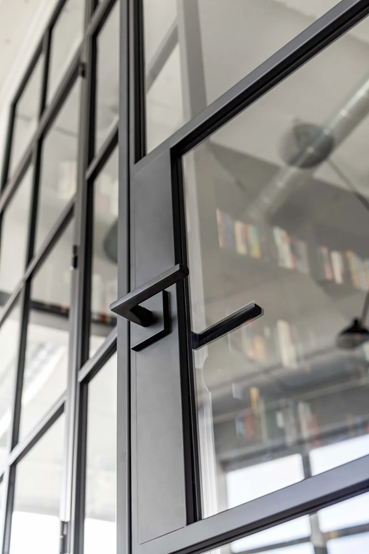 Detail of industrial style door hardware and framing
