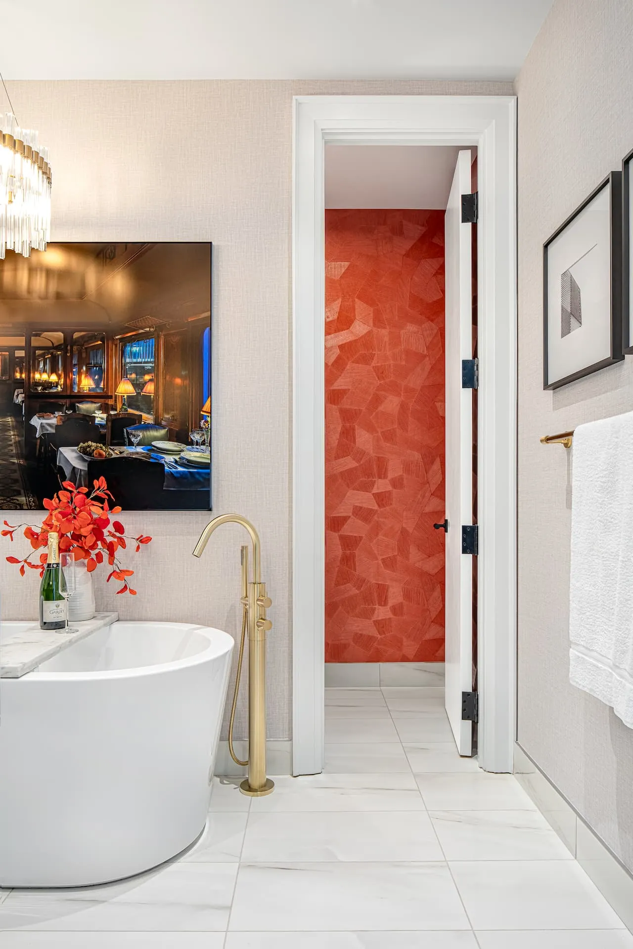 Witty artwork of Batman pouring tea over a freestanding tub in a spa ensuite