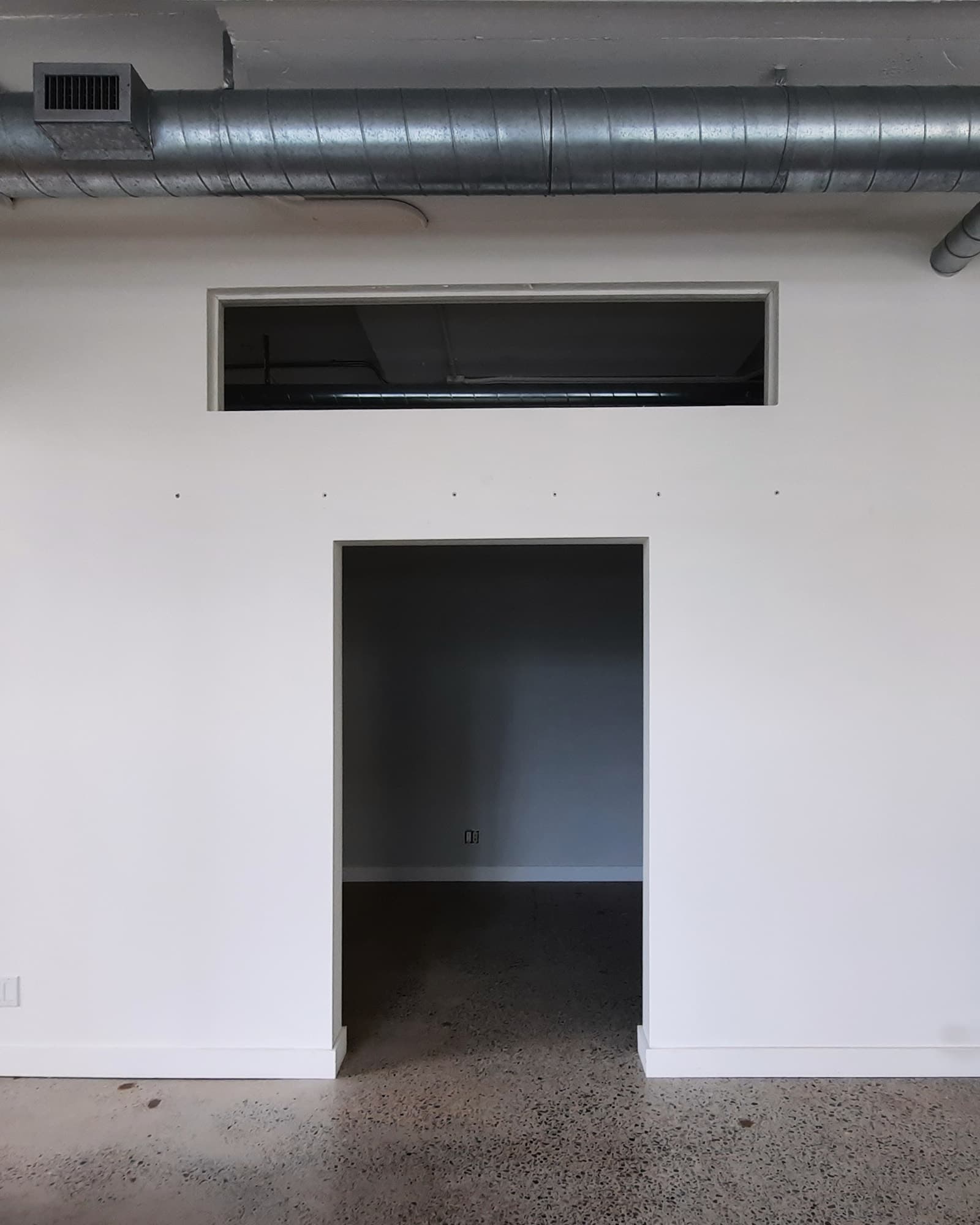 Skim coated wall surfaces around the prepared opening