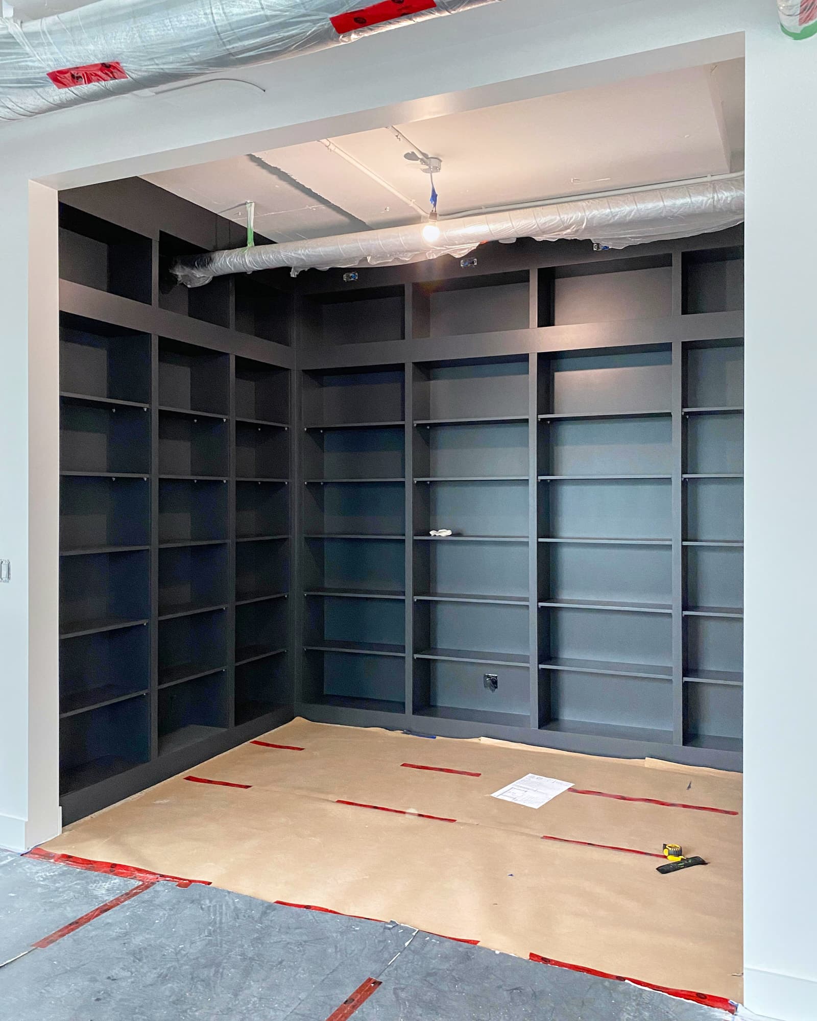 Glass panes installed in the black steel door system